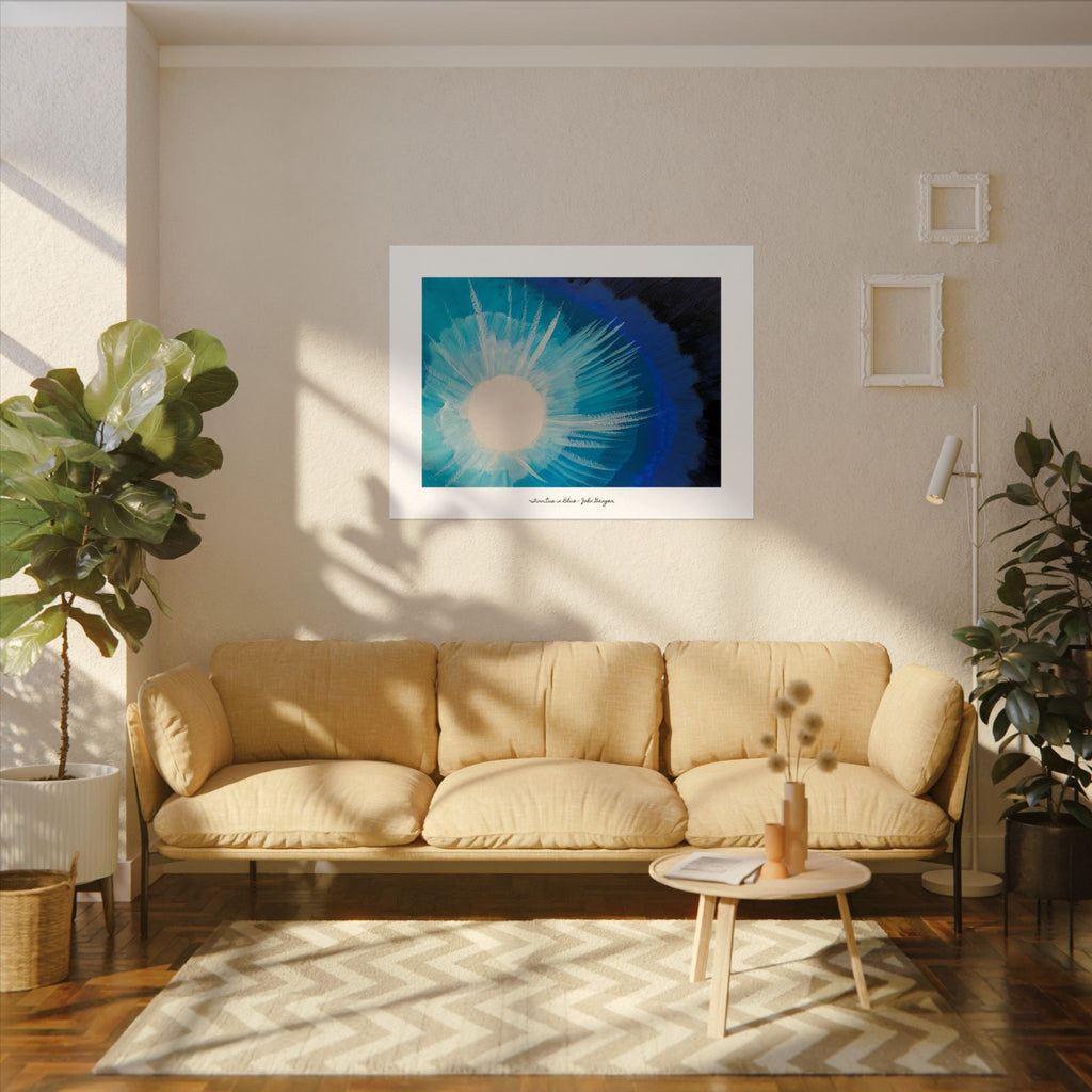 Living room with beige sofa, coffee table, and abstract art on the wall.