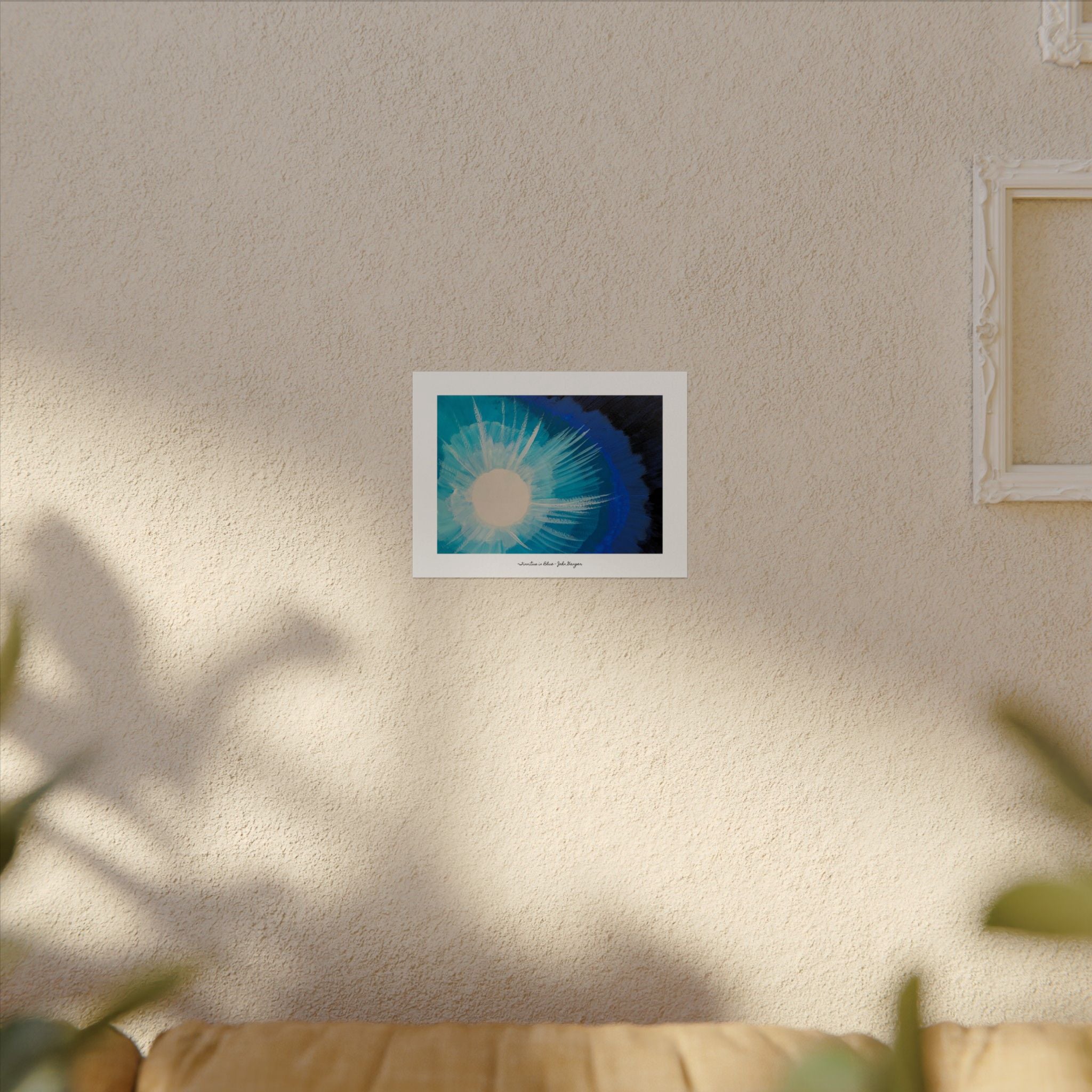 Framed artwork on a wall with a neutral background