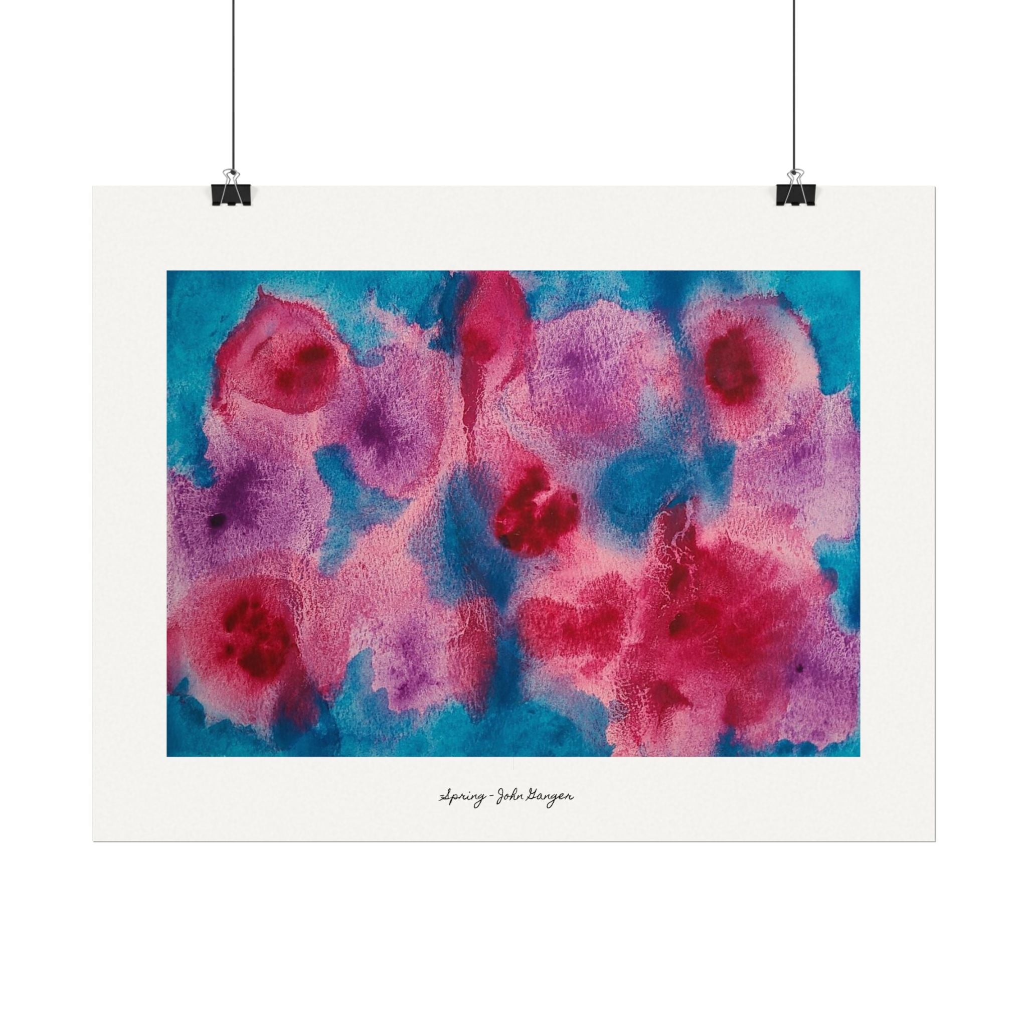 Art print with pink and red floral design on a blue background, signed by John Singer, hanging on a white wall.